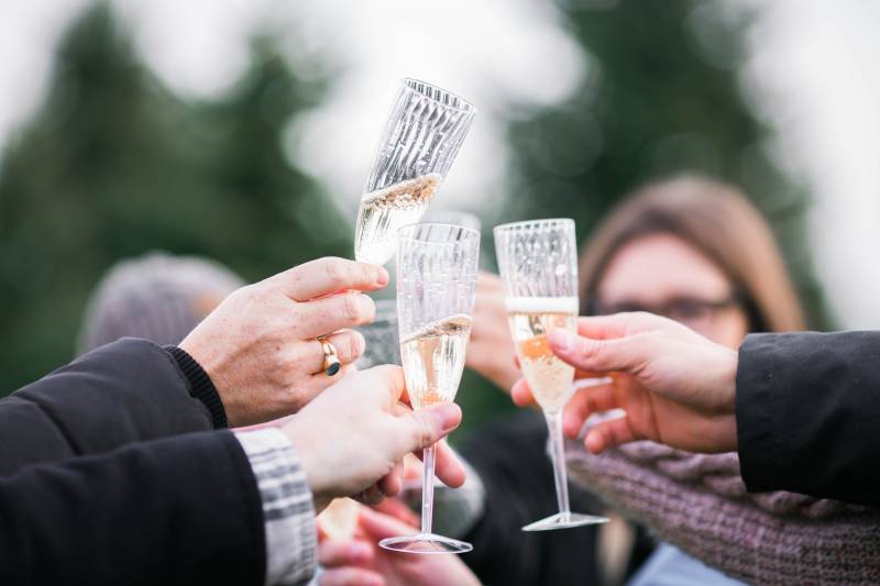 A group of people toasting with champagne glasses
